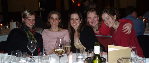 Deanna with fellow astronomy students at a conference dinner