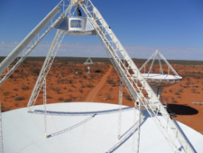 An elevated view of four of CSIRO's new ASKAP antennas, October 2010. Credit: Ross Forsyth, CSIRO.