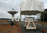 The PAF awaits testing to begin in front of the 12-m Patriot antenna of the Parkes Testbed Facility. Credit: John Sarkission, CSIRO.
