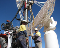 Contractors drilling bore holes as part of a trial geoexchange system for cooling ASKAP’s antennas. Credit: Graham Allen, CSIRO.