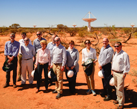 The VIP group at the MRO, standing in front of ASKAP antennas.