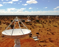 CSIRO's ASKAP antennas on site at the Murchison Radio-astronomy Observatory.  Credit: Dragonfly Media.