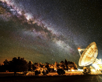 The Parkes telescope under a starry sky. Credit: Wayne Englund.