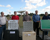 Representatives from NRC, ASTRON and CSIRO with their PAF elements during testing. Credit: John Sarkissian, CSIRO.