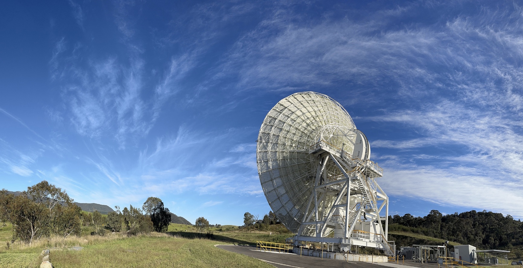 The Deep Space Station 36 antenna at the Canberra Deep Space Communication Complex, pointing at the horizon.